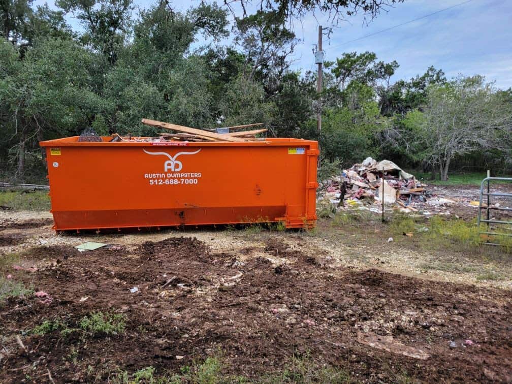 full dumpster at demolition site