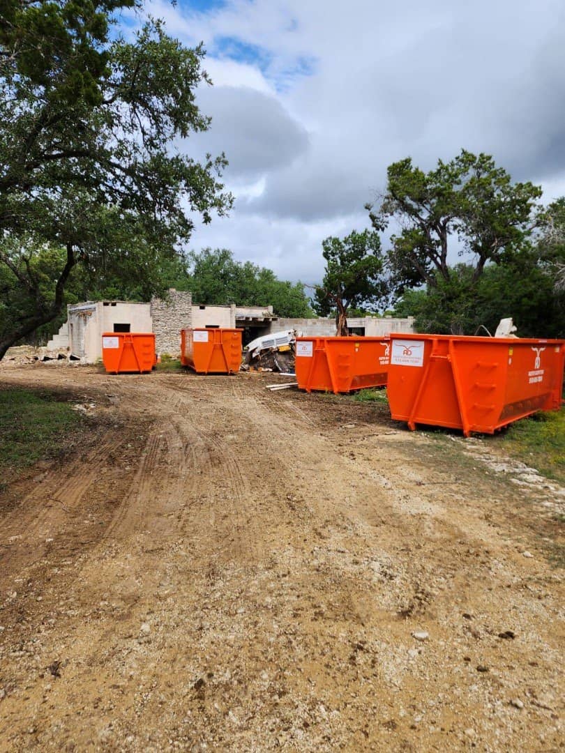 4 dumpsters at demolition site