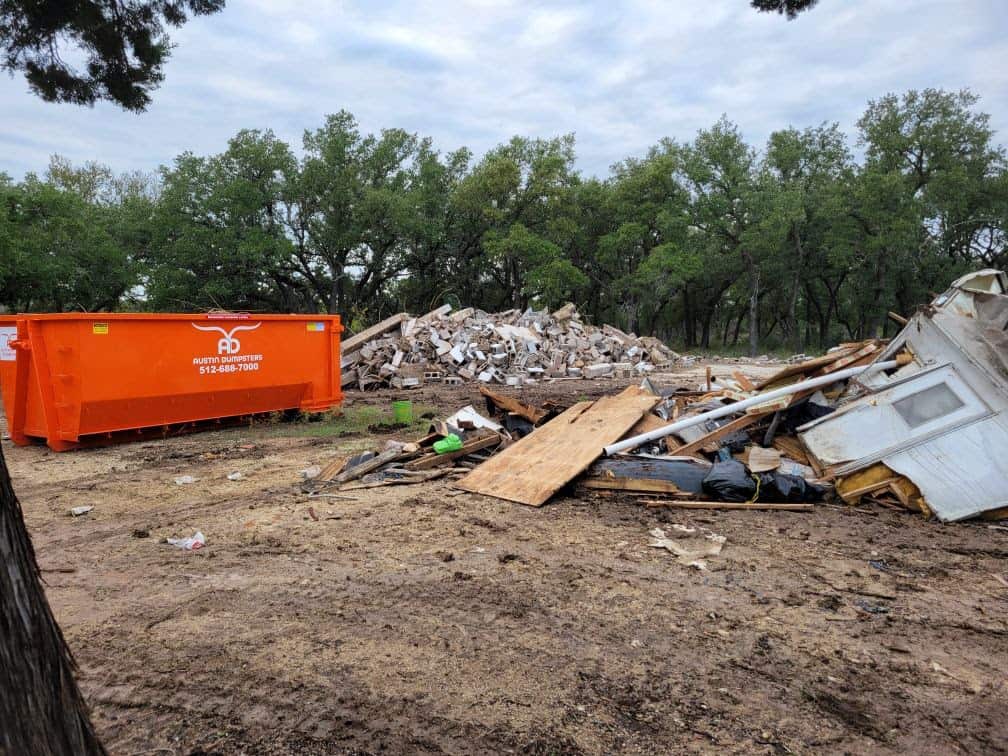 demolition site and dumpster